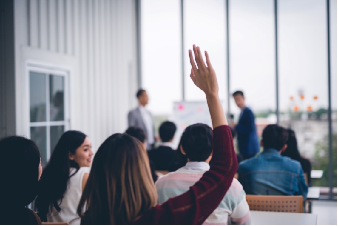 Lady raising hand